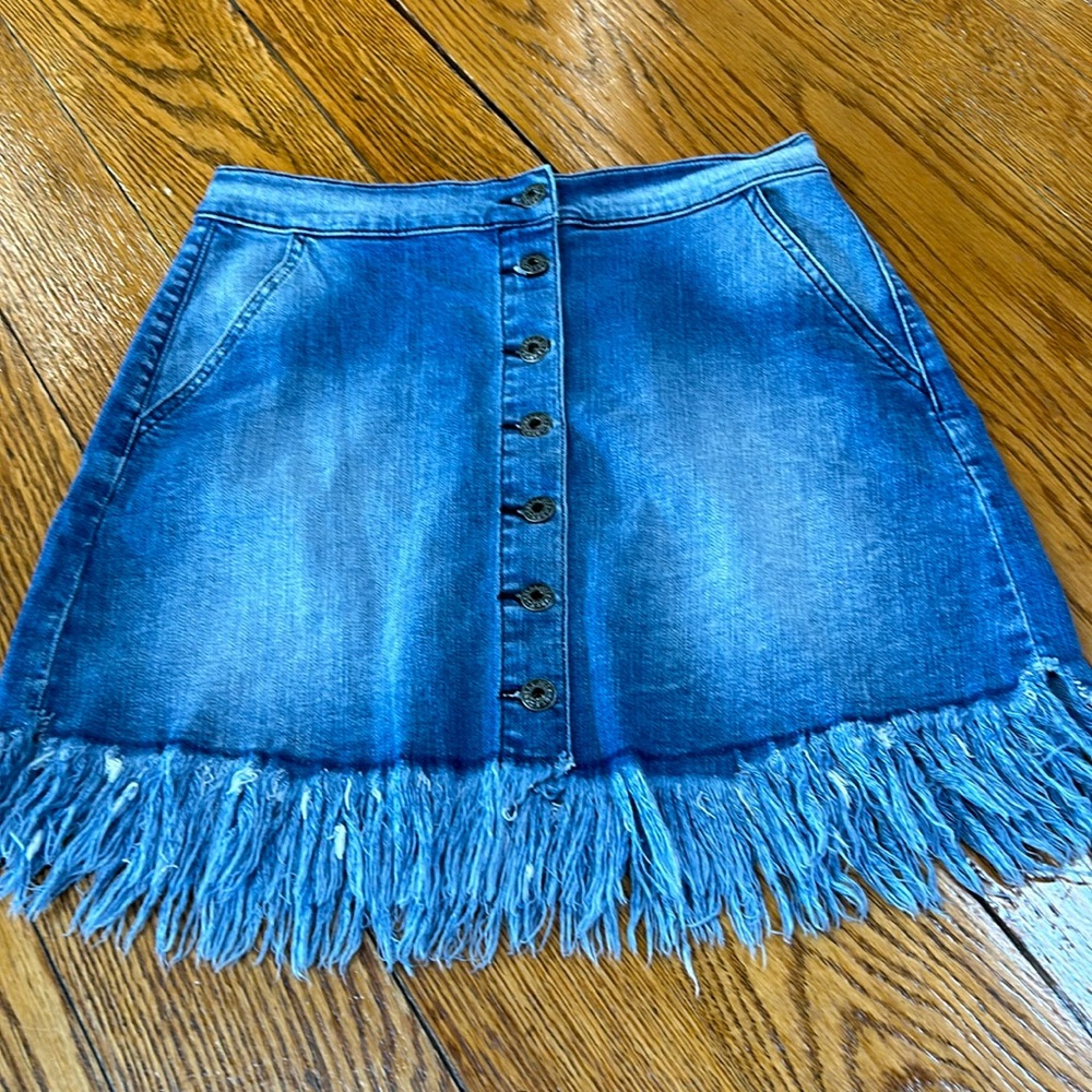 Sneak Peek denim raw hem mini skirt. Button front.  Front pockets. Medium.